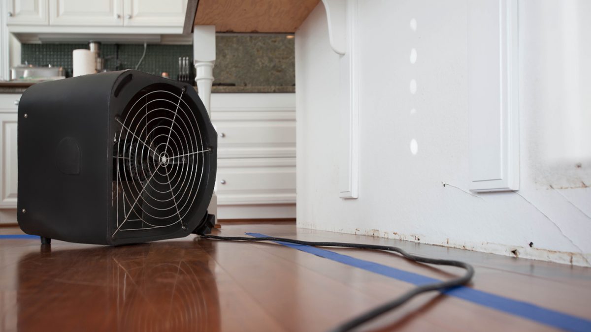 Air mover drying water damage - On Side Restoration