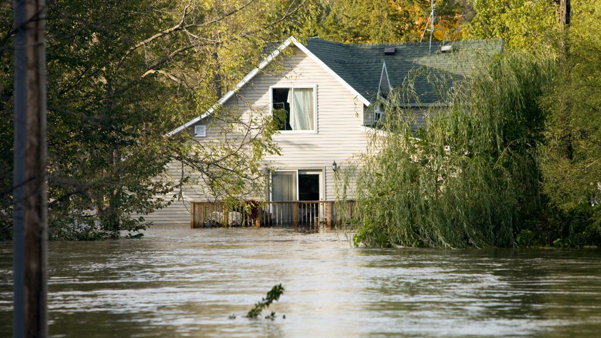 A flooded area and a family home.
